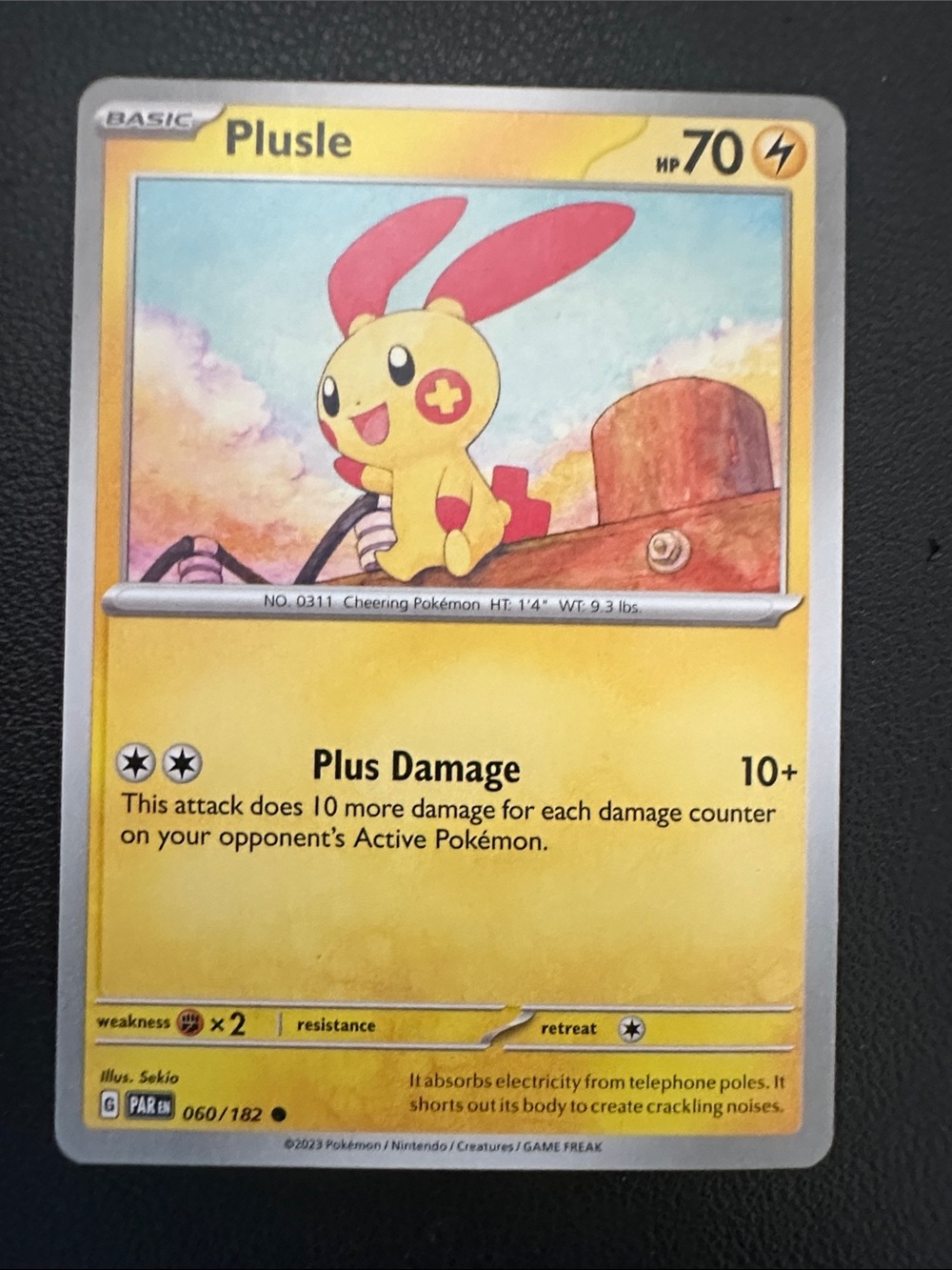 Plusle Trading Card - Yellow and Red